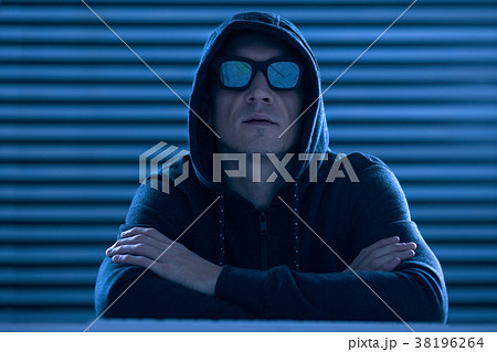 Cool male hacker stealing data 38196264