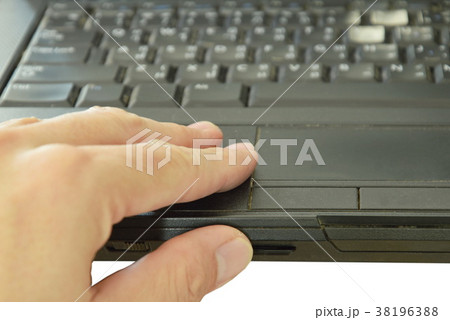 thumb pressing SD card put in computer notebook thumb pressing SD card put in computer notebook 38196388