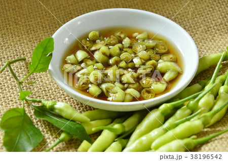 fresh green chili slice and mixed in fish sauce fresh green chili slice and mixed in fish sauce 38196542