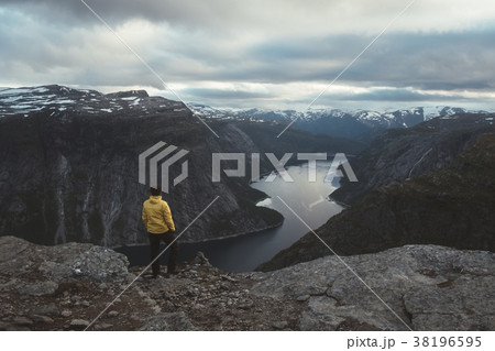 Alone tourist on Trolltunga rock 38196595