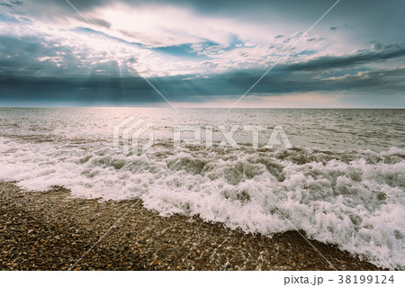 Sea Ocean Waves Washing Pebble Stones Beach At Sea Ocean Waves Washing Pebble Stones Beach At 38199124
