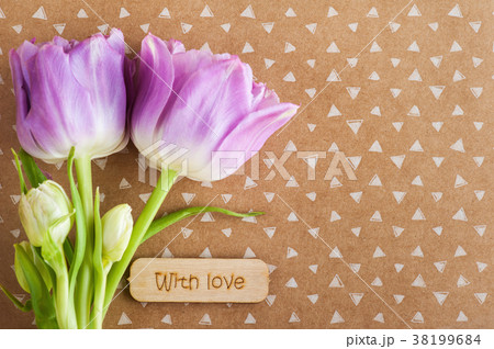 Purple tulip flowers and wooden sign Purple tulip flowers and wooden sign 38199684