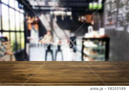 Selected focus empty brown wooden table and Coffee shop or resta Selected focus empty brown wooden table and Coffee shop or resta 38203589