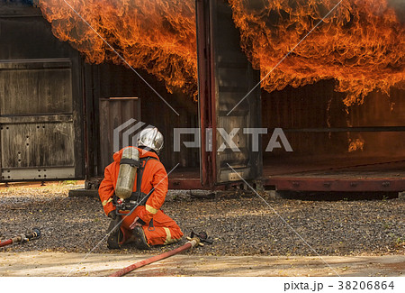 Firefighters fighting a fire,Firefighter training 38206864