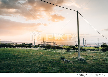 Electrical Power Lines at sunset Electrical Power Lines at sunset 38207457