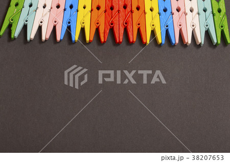 Colorful clothespins kept in row Colorful clothespins kept in row 38207653