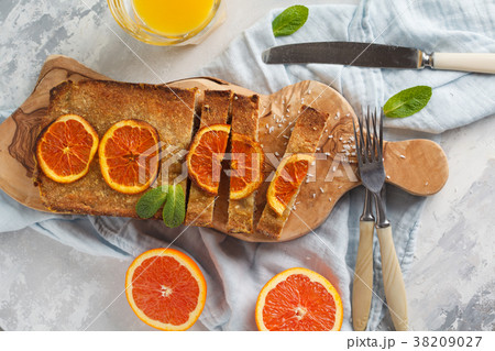 Healthy homemade orange-coconut cake 38209027