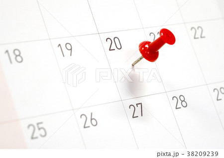 Embroidered red pins on a calendar on the 20th Embroidered red pins on a calendar on the 20th 38209239