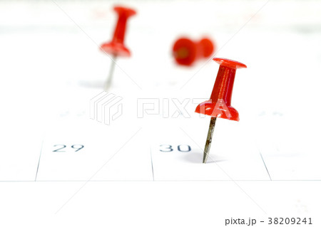 Embroidered red pins on a calendar on the 30th  38209241