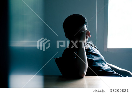 Asian men have stress Headache at meeting room 38209821