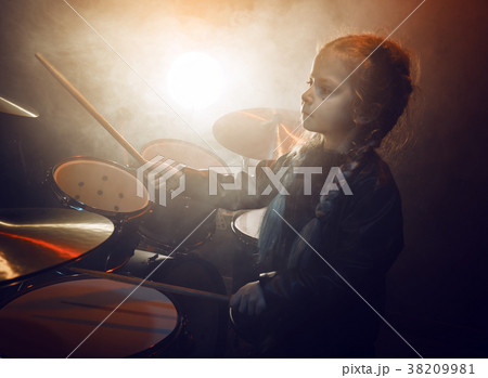 A little drummer girl. 38209981