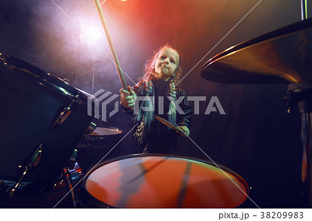 A little drummer girl. 38209983