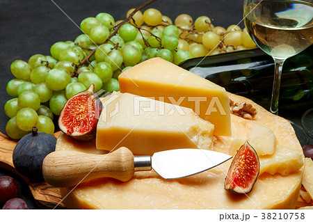 Whole round Head of parmesan or parmigiano hard Whole round Head of parmesan or parmigiano hard 38210758
