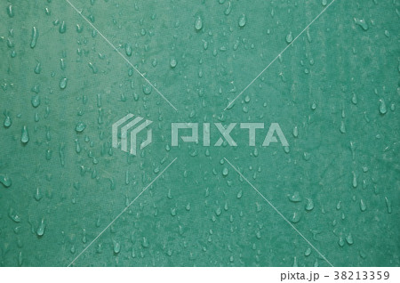 drop of water and stain on green tile bathroom 38213359