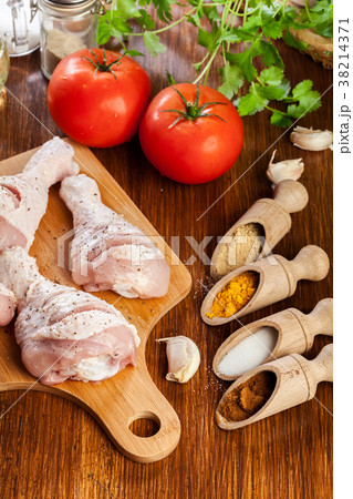 Raw chicken legs with spices Raw chicken legs with spices 38214371