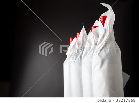 Four bottles on black Four bottles on black 38217869