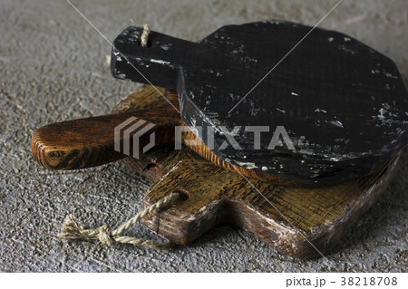 Wooden cutting boards on grey concrete background 38218708