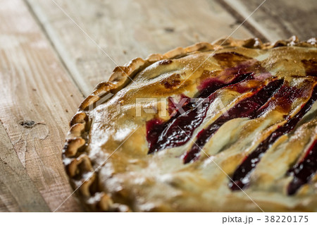 Berry pie with blueberries close-up on a plate on 38220175