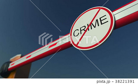 Closed barrier gate with NO CRIME sign. Conceptual 38221391