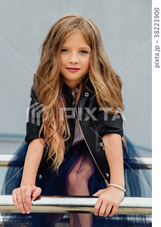 Urban fashion portrait of a teenage girl in the Urban fashion portrait of a teenage girl in the 38221900