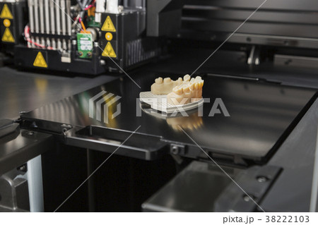 3D Printer With Finished 3D Dental Implant Bridge 38222103