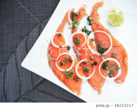 Smoked salmon on dish Smoked salmon on dish 38223217