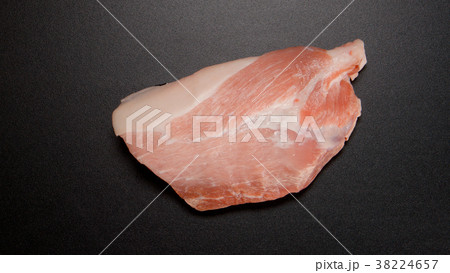 Fresh pork steak on black table Fresh pork steak on black table 38224657