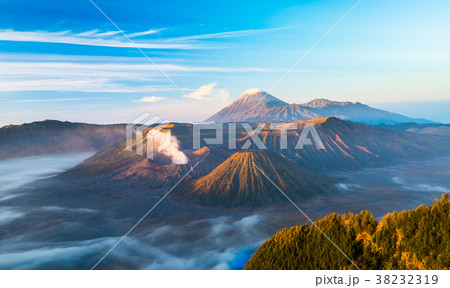 Bromo volcano while sunrise Bromo volcano while sunrise 38232319