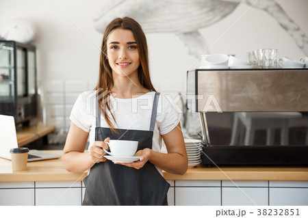 Coffee Business Concept - Caucasian female serving 38232851