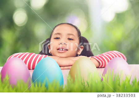 Cute asian little girl hunt easter eggs 38233503