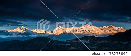 The peak of the Meili mountains at sunrise 38233842