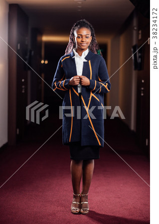 Beautiful black woman smiling at camera. Beautiful black woman smiling at camera. 38234172