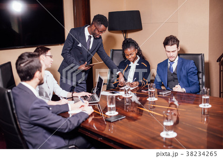 African American business man giving presentation African American business man giving presentation 38234265