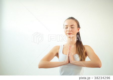 woman practicing yoga and meditation, holding woman practicing yoga and meditation, holding 38234296