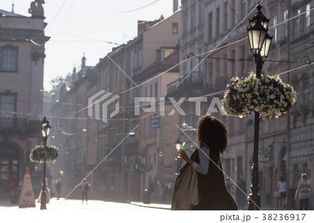 Closeup shot of black girl drinking wine outside 38236917