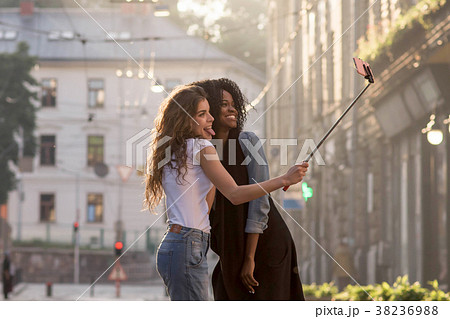 Two young and attractive girls making selfie on Two young and attractive girls making selfie on 38236988