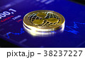 Gold coins of the ripple on the background of a 38237227