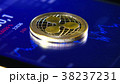 Gold coins of the ripple on the background of a 38237231