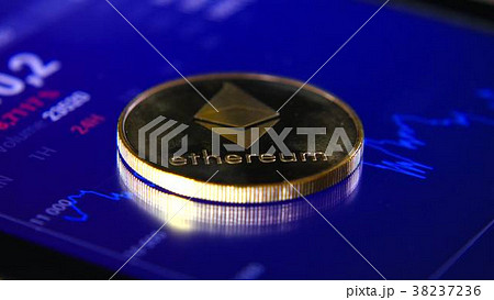 Gold coins of the ethereum on the background of a Gold coins of the ethereum on the background of a 38237236