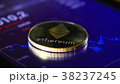 Gold coins of the ethereum on the background of a 38237245