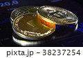 Golden bitcoins on the background of a graphic 38237254