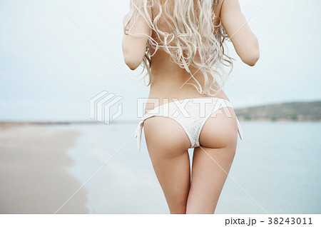 Beautiful slender blonde at the sea 38243011