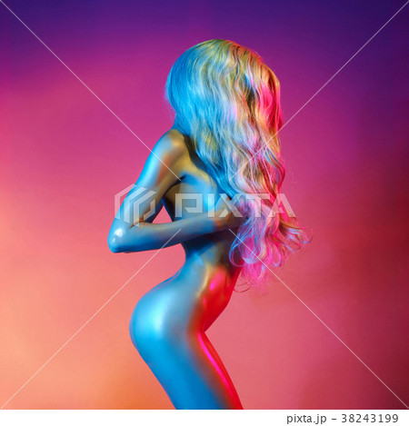 Nude sexy blonde in colorful light. 38243199