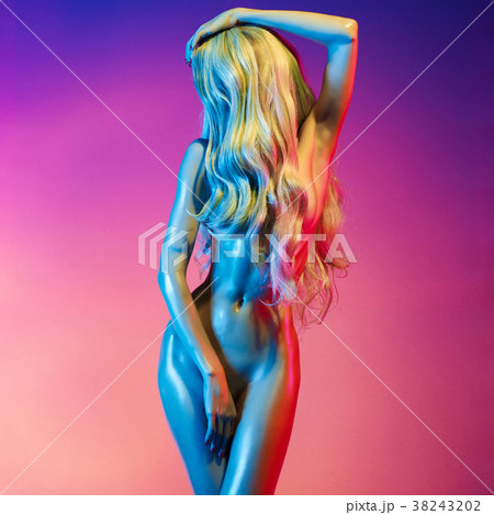 Nude sexy blonde in colorful light. Nude sexy blonde in colorful light. 38243202