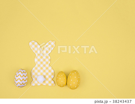 Creative easter composition with painted eggs. 38243437