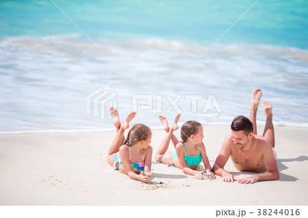 Father and kids enjoying beach summer tropical Father and kids enjoying beach summer tropical 38244016