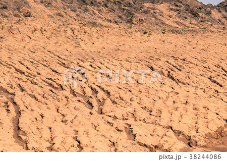 Dry sand erosion from the stream Dry sand erosion from the stream 38244086