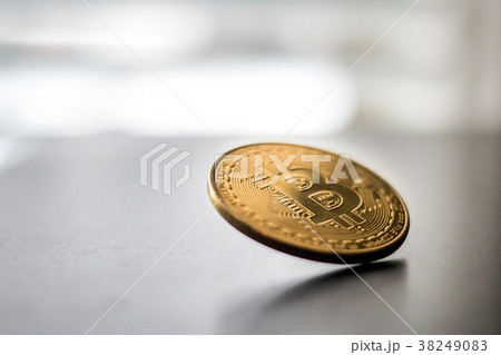 Single bitcoin front coin falling down 38249083