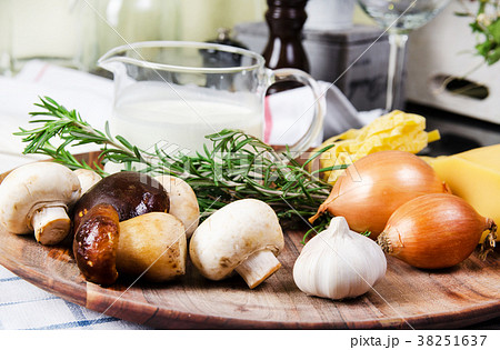Ingredients pasta tagliatelle  with mushrooms 38251637