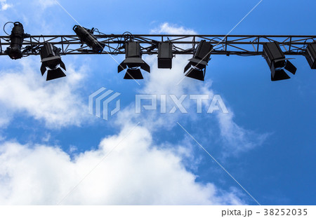 Spotlights against blue sky 38252035